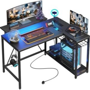 Bestier Small Gaming Desk with Power Outlets,42 L Shaped LED Computer Desk with Stand Reversible Shelves,Corner Gamer Desk with Headset Hooks USB Charging Port,Carbon Fiber Black